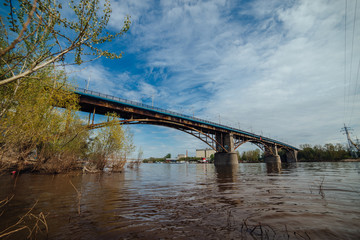 Fototapeta na wymiar Samara, Russia - May 12, 2018: Old bridge over the Samara river