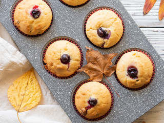Homemade muffins in baking tin.