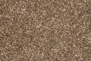 Lot of whole fresh mottled chia seeds flatlay isolated