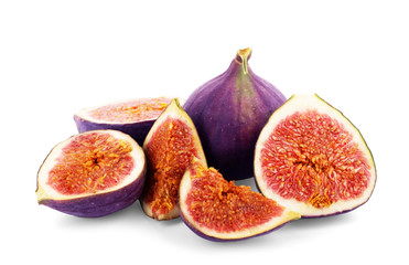 Figs cut into pieces on a white background