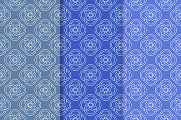 Blue geometric ornaments. Set of seamless patterns