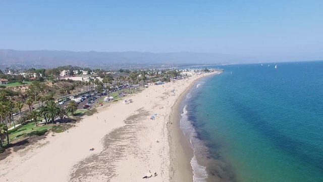 California beach flyover with a small pan to the right