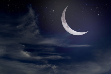 Fototapeta na wymiar Stars, moon and cumulonimbus in the night sky