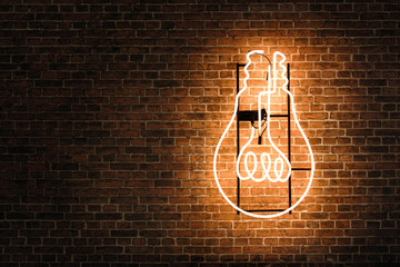 Lightbulb neon on the empty brick wall with copy space © rangizzz
