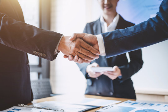 Finishing up a meeting, Business shaking hands after discussing good deal of Trading to sign agreement and become a partner, contract for both companies, Successful businessman handshake