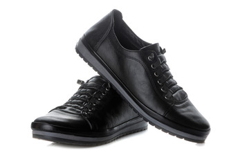 Black women's sneakers. women's shoes. black style. on white isolated background