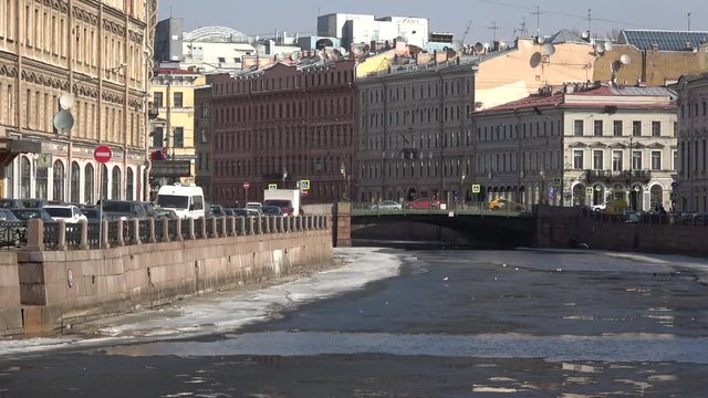 Sunny April Day On The Moika River, View Of The Green Bridge. Saint Petersburg