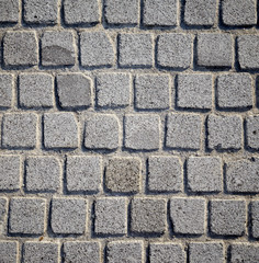 Gray stone wall, textured.