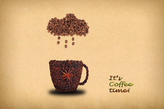 Fototapeta Creative concept photo of a cup of coffee and cloud with rain  made of coffee beans.  Inscription  "It's coffee time!"