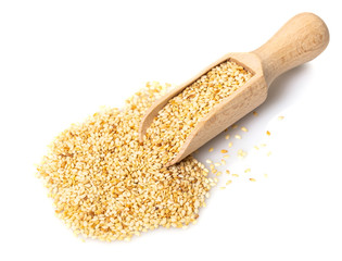 sesame seeds in a wooden scoop