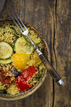 Bowl of oven vegetables with couscous