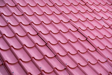 Abstract pattern of red roof tiles