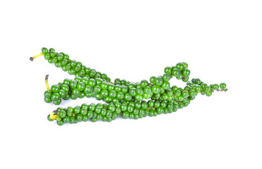 Fresh green peppercorns isolated on a white background