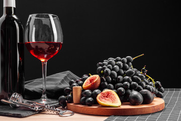 wine and grapes on the table