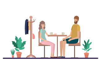 couple drinking coffee in the living room