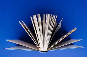 Open book on blue background