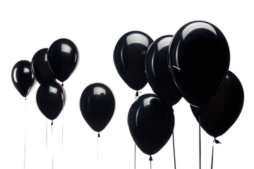 black balloons isolated on white background for black friday © LIGHTFIELD STUDIOS