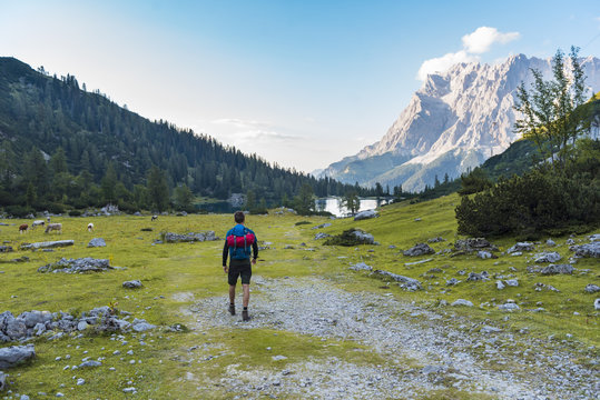 Austria, Tyrol, Hiker with backpack, hiking at Lake Seebensee