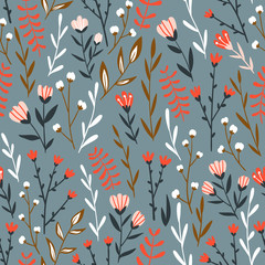 Obraz na płótnie Canvas Seamless floral design with hand-drawn wild flowers. Repeated pattern can be used for web page background, surface textures and fabrics. Vector illustration.