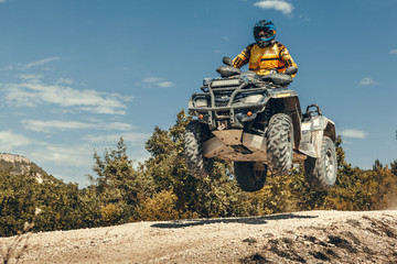 ATV jump in the mountains © fotofabrika