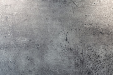 Graue Wand mit einer Betonstruktur