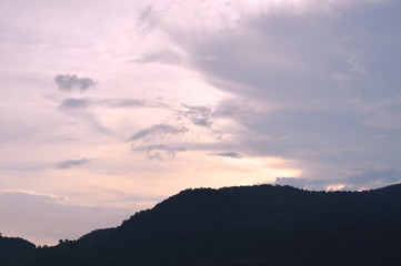 mountain covering by rain cloud on sky