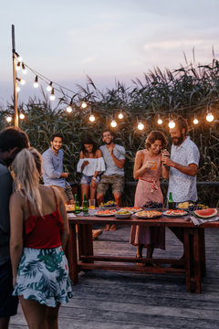 People Enjoying Summertime Party