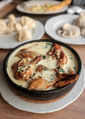Chicken in a creamy sauce with garlic and herbs. 