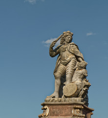Fototapeta na wymiar Ludwigsburg, Germany – stone statue of the king in the crown.