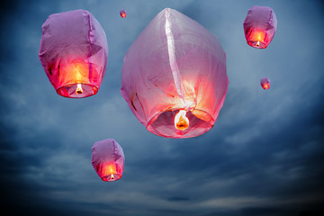balloon fire Sky lanterns flying lanterns, hot-air balloons Lantern flies up highly in the sky. Floating lanterns at dawn during