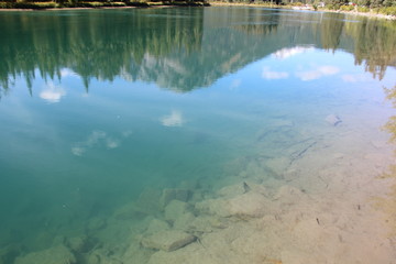 Reflections On The Bow River, Banff National Park, Alberta