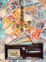 Wallet with indian currency. 10, 20, 50, 100, 200, 500 and 2000 Indian rupees, old and new notes.
