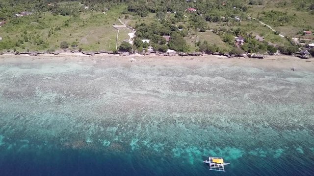Drone footage over the coast of Moalboal in Cebu, Philippines