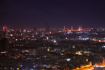 Fototapeta na wymiar night cityscape of rainbow bridge in metropolis