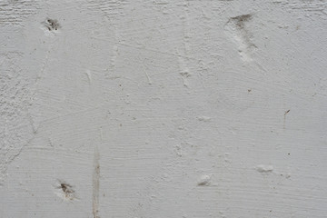 Wall fragment with scratches and cracks. It can be used as a background