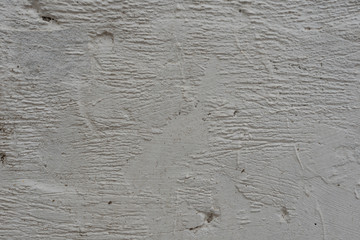 Wall fragment with scratches and cracks. It can be used as a background