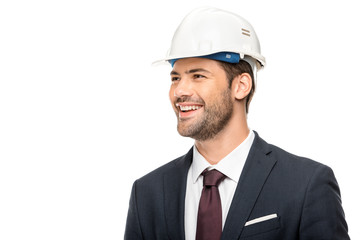 portrait of smiling young male architect looking away isolated on white