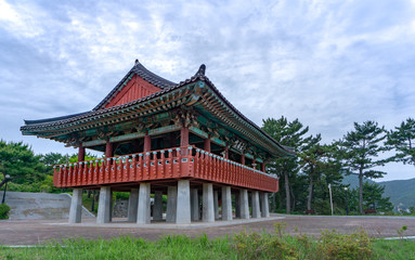 Fototapeta na wymiar Traditional Korean style pavilion at Okpo great vitory commemoative park on Geoje island, Gyeongsangnam-do, South Korea.