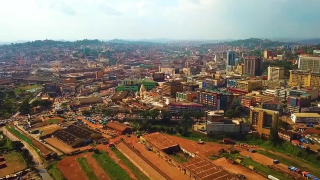 Beautiful sunny side angled aerial of Kampala Uganda