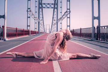 Dance is life. Attractive nice woman feeling the dance while expressing herself via movements © Viacheslav Yakobchuk