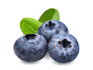 Blueberries with green leaves closeup, isolated on white background