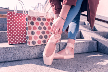 Professional shoes. Close up of a new female pointe shoes ob ballerinas feet © Viacheslav Yakobchuk