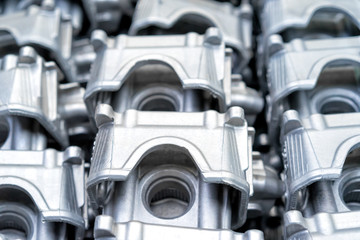 Pile of aluminum automotive parts head cylinder, casting process in the automotive factory