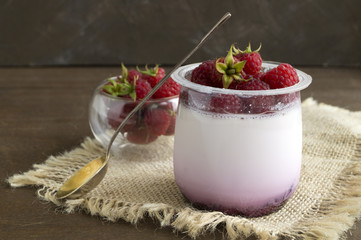 Homemade healthy diet yogurt with raspberries. selective focus