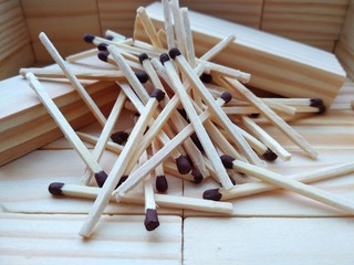 pile of matches on black background