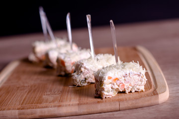 Canapes with cream cheese and vegetable