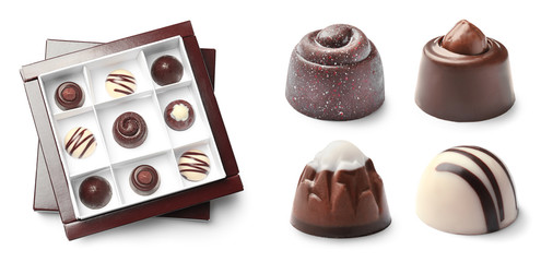 Set with delicious chocolate candies on white background