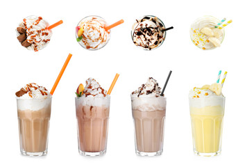 Set with different delicious milk shakes on white background