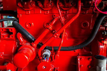 Diesel engine fire pump, Industrial fire extinguishing system with control system red piping and valve.