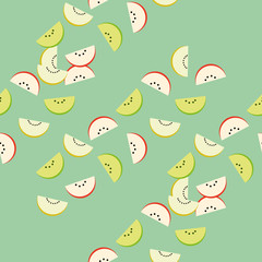Obraz premium Pattern of slices of watermelon, apple, kiwi, orange, tangerine, melon - sweet urashenie on a green background